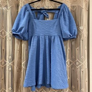 Textured Free People Baby Doll Dress. Tie back.